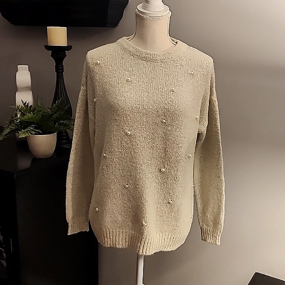 All:row sweater with pearls on front size large pit to pit 24 inches/length 29in